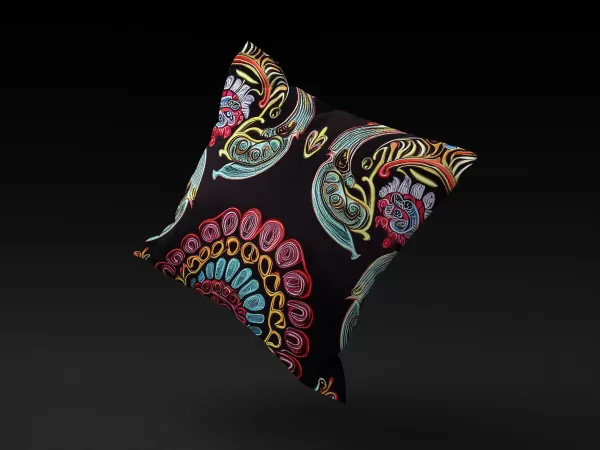 Floating Ebony Bloom Bennu Majesty pillow cover, highlighting its rich ebony hues and detailed patterns.