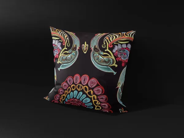 Side view of Ebony Bloom Bennu Majesty pillow cover, showcasing the intricate floral and Bennu bird design.