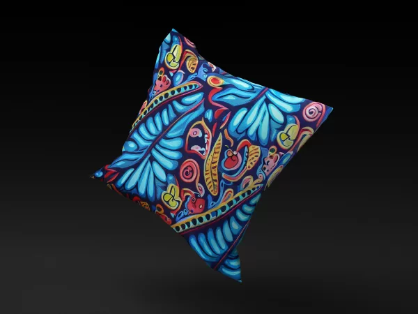 Madagascar SeaGarden pillow cover floating against a black backdrop, highlighting its vivid marine-inspired colors.