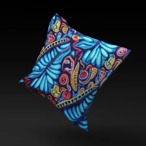 Madagascar SeaGarden pillow cover floating against a black backdrop, highlighting its vivid marine-inspired colors.