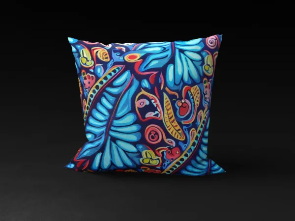 MUNACHU Madagascar SeaGarden pillow cover, featuring vibrant coral-inspired patterns on a blue background.