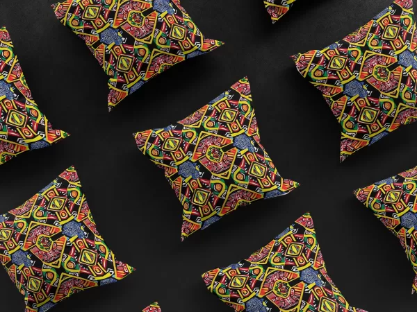 3x3 grid of Ashanti Dreamweaver pillow covers against a black background, displaying the consistent beauty and design of the luxurious, African-inspired product.