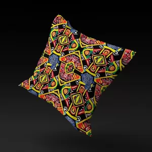 Ashanti Dreamweaver pillow cover floating against a black background, highlighting its kaleidoscopic patterns and enigmatic animal-like figure.