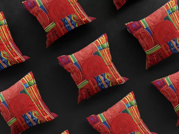 A 3x3 grid of Chamarel Allure pillow covers, each one a kaleidoscope of colors and intricate designs.