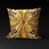 Cleopatra's Gilded Flight pillow cover showcasing intricate golden designs on a black background.