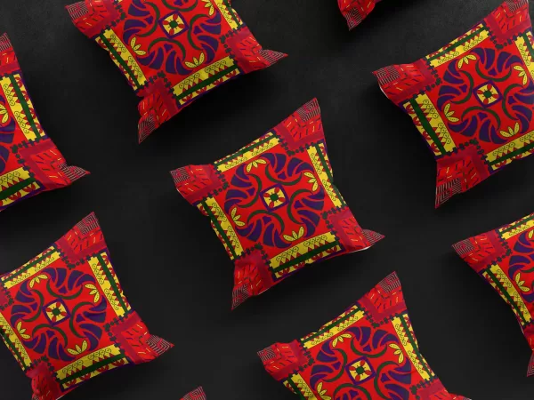 A 3x3 grid of Nsude's Compass pillow covers, each one a tribute to the Nsude pyramids and Igbo heritage.