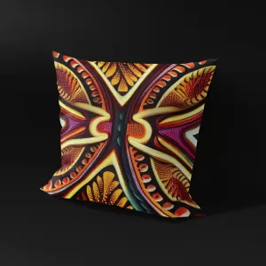Side angle of Mulungu Monarch pillow cover with intricate patterns.