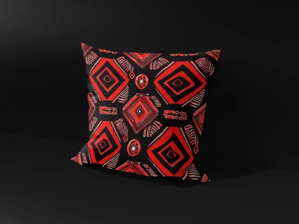 Side angle of Omenala Rosette pillow cover, showcasing the intricate design and vibrant red color.