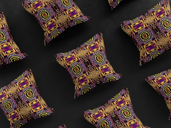 3x3 grid of Saharan Mosaic Mirage pillow covers against a black background, displaying the consistent beauty and design of the luxurious, African-inspired product. Each cover features intricate geometric patterns on a warm yellow background with accents of pink, blue, white, and black.