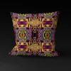 Front view of Saharan Mosaic Mirage pillow cover against a black background, featuring intricate geometric patterns of squares and diamonds on a warm yellow background with accents of pink, blue, white, and black.
