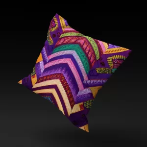 Venda Vibrance pillow cover floating against a neutral background, highlighting its colorful chevrons.